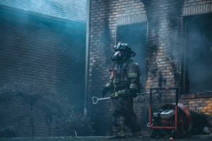 a firefighter after extinguishing a home fire.