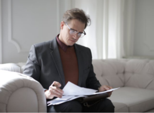 An individual examining a property insurance policy